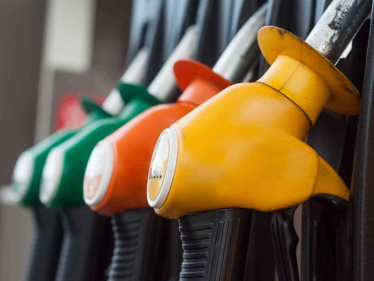Close up or yellow, green and orange fuel bowsers