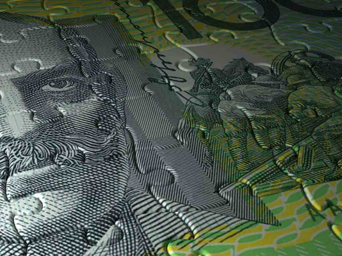 Close up of an Australian one hundred dollar note puzzle