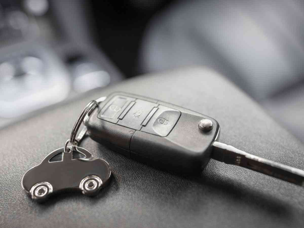 Car shape keyring and remote control key in vehicle interior